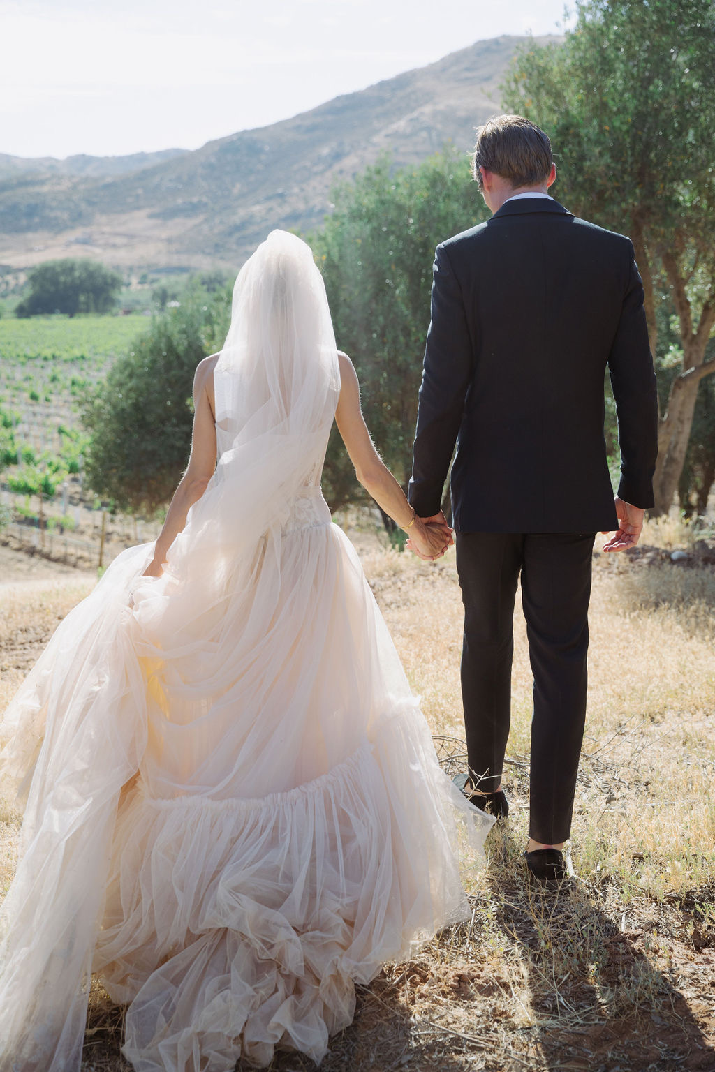 Natalie and Kyle walking together at Bruma Wine Resort
